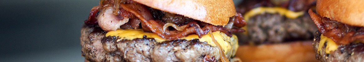 Eating Burger Fast Food at Tom's Jr Burger restaurant in Los Angeles, CA.